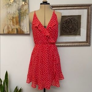 Divided red dress with white polka dots